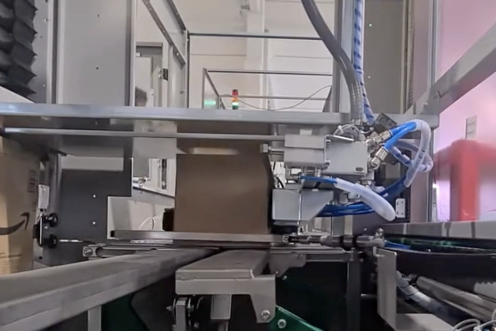 可湿水胶带开箱机-加强筋网状牛皮纸开箱机