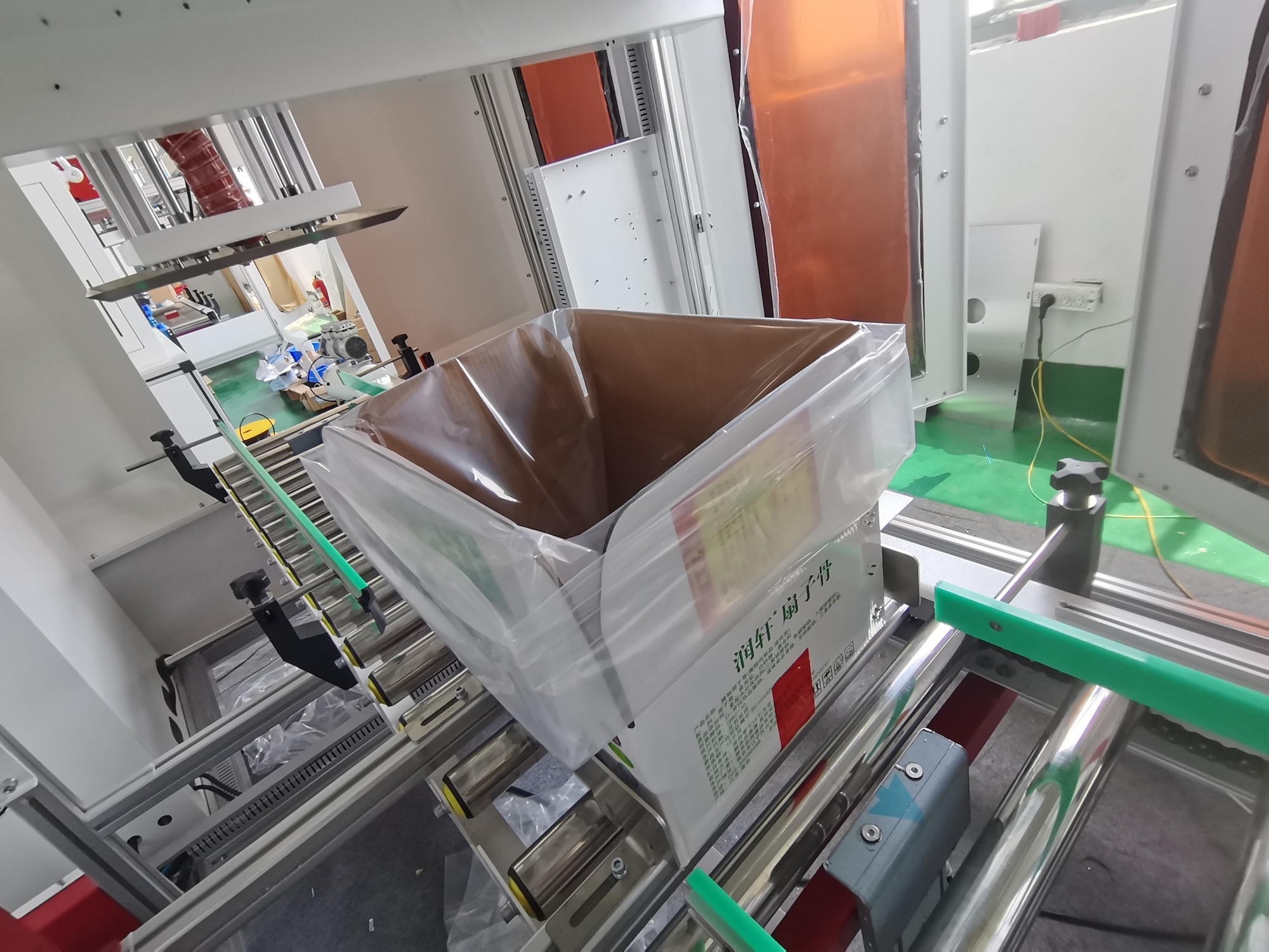 油脂纸箱套袋机-塑料框套袋机-自动套袋机检修